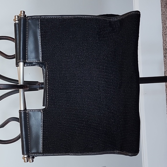 The Sak black clutch purse with metal handle bars - Picture 2 of 12